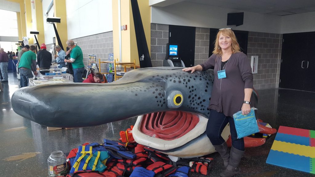 Peggy Gabrielson and the Canoecopia fish.