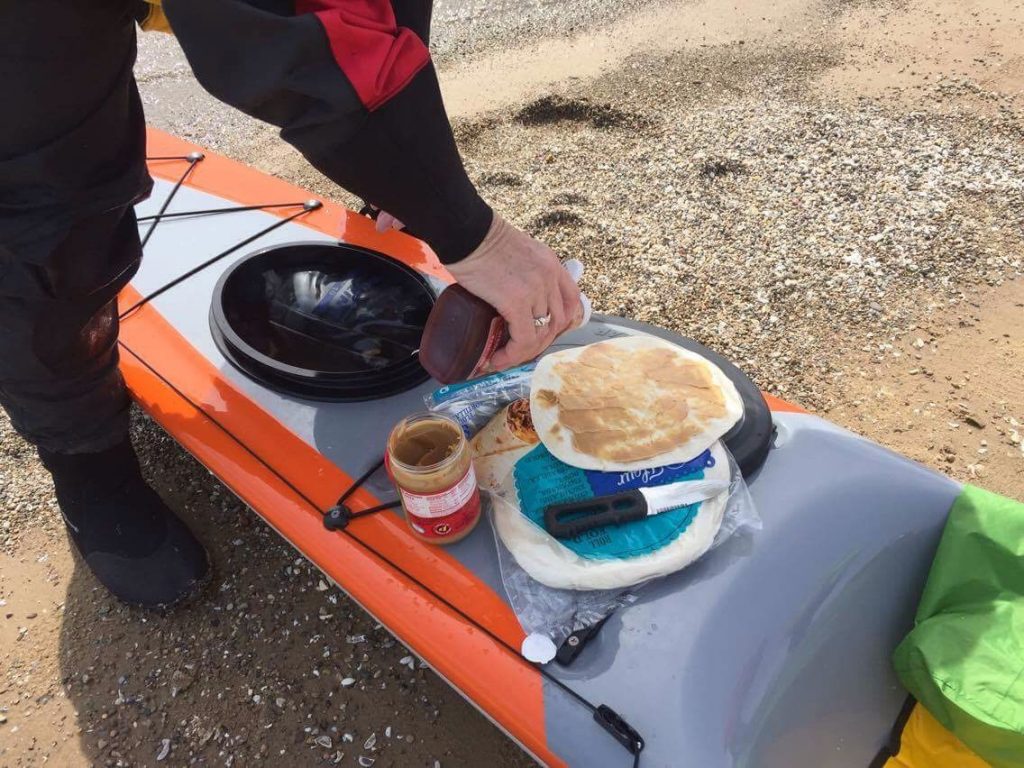 2 Paddling 5 lunch on a kayak.