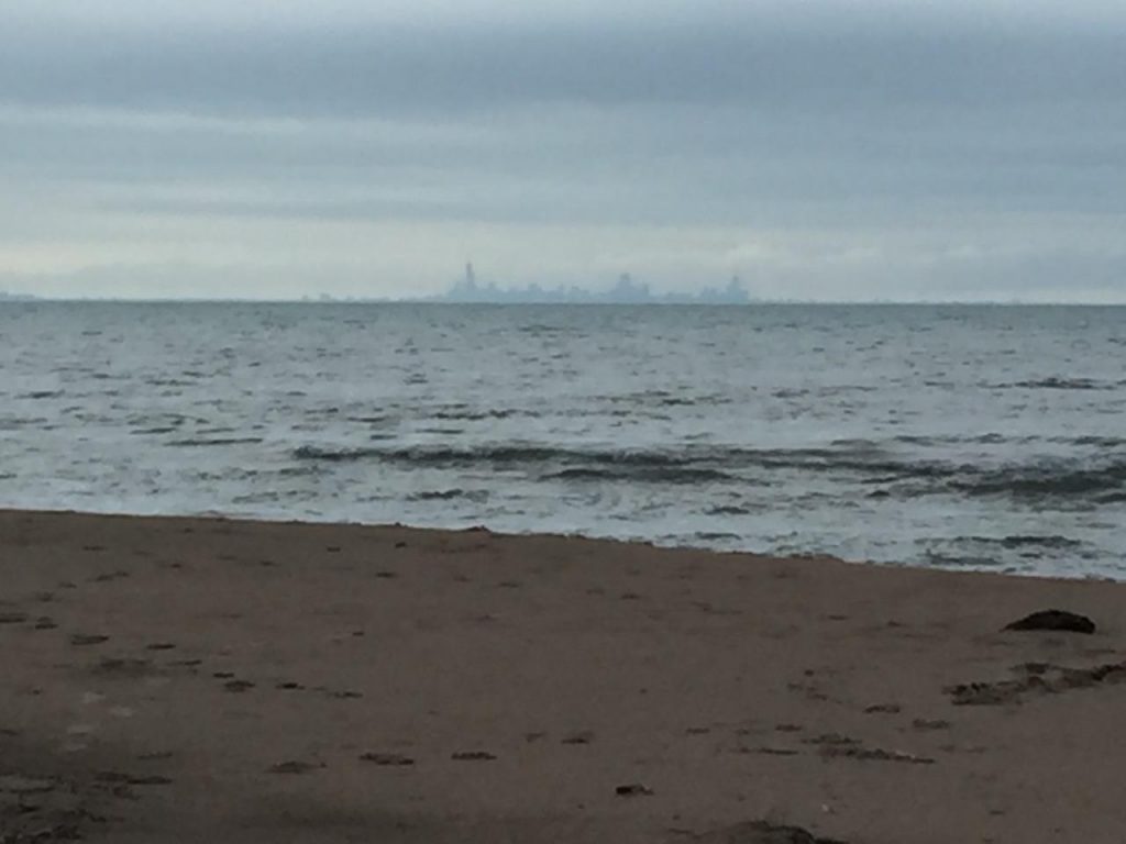 Chicago skyline from a beach across Lake Michigan.