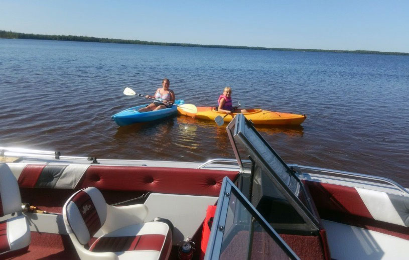 Darrin Teri and family kayaking on Lake Superior.