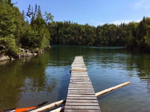 Dock on the Pigeon River, Ontario, Canada.
